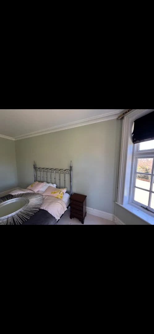 Bedroom redecoration with sage walls – after