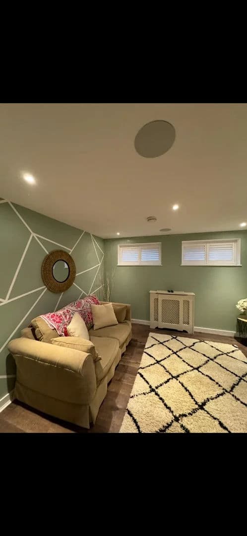 Living room ceiling repair and feature wall – after